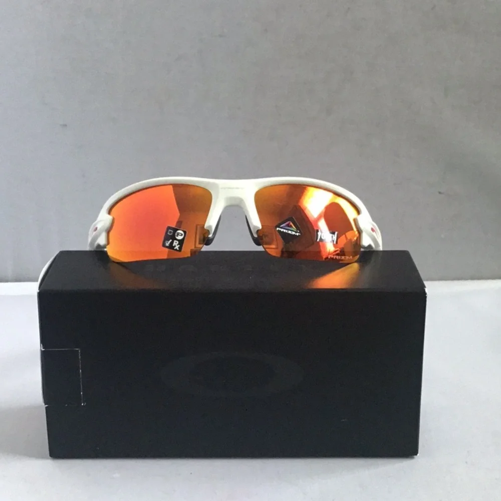 Oakley Youth Sunglasses with White Frame and Orange Lenses